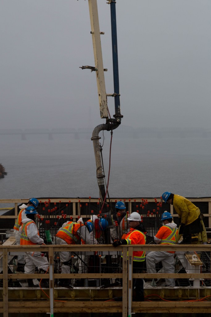 Pouring of the first concrete footing for the new Champlain Bridge
