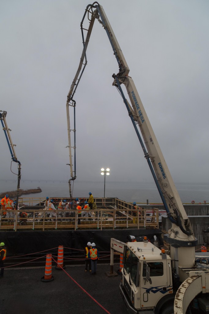 Pouring of the first concrete footing for the new Champlain Bridge